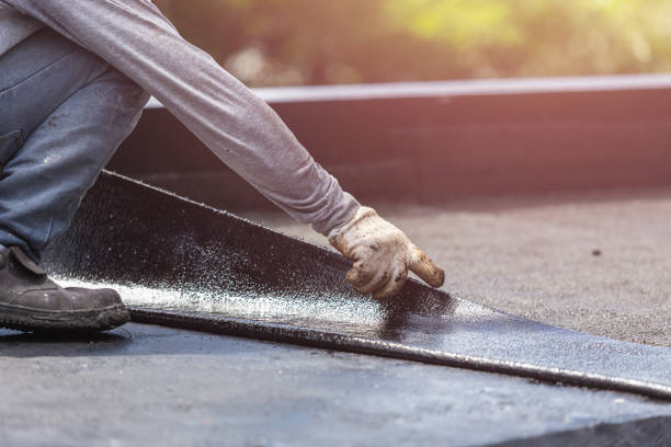 Professional Basement Waterproofing technician working in Kelleys Island, OH
